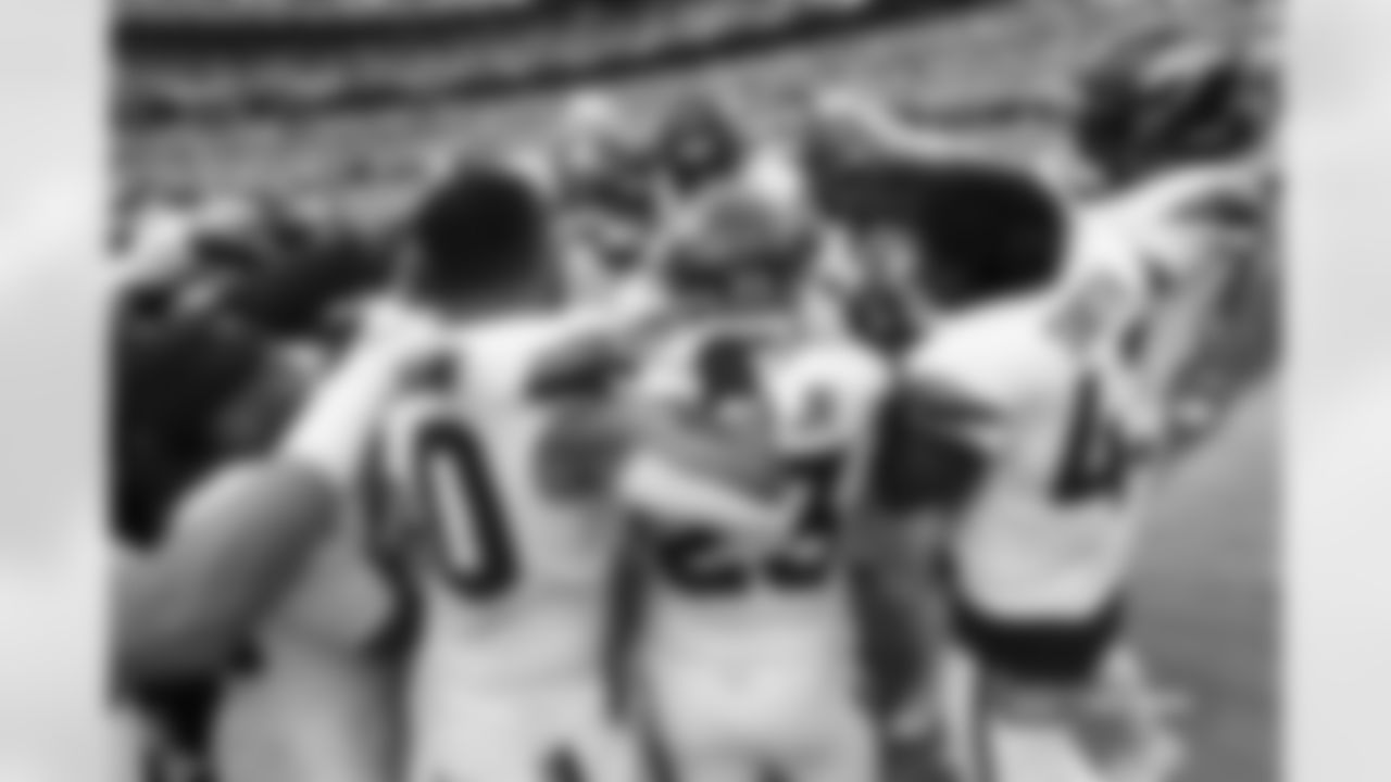 Players celebrate with Levelle Bailey during the Broncos' preseason Week 3 game against the Arizona Cardinals at Empower Field at Mile High in Denver, Colorado on August 25, 2024. Photo by Nicole Pennetta / Denver Broncos