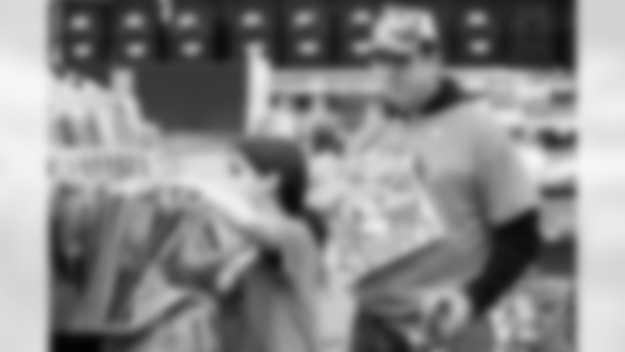 Children from the Denver Broncos Boys & Girls Club participate in a Shop with a Jock shopping spree with Broncos players, alumni and cheerleader alumni in Aurora, Colorado on December 2, 2025. Photo by Ben Swanson / Denver Broncos