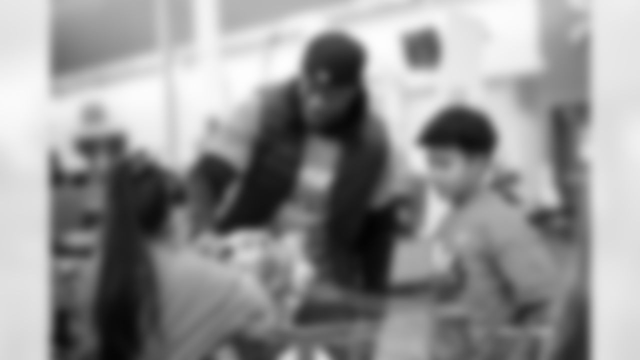 Children from the Boys & Girls Club participate in a Shop with a Jock shopping spree with Broncos players, alumni and cheerleader alumni in Aurora, Colorado on December 15, 2025. Photo by Ben Swanson / Denver Broncos