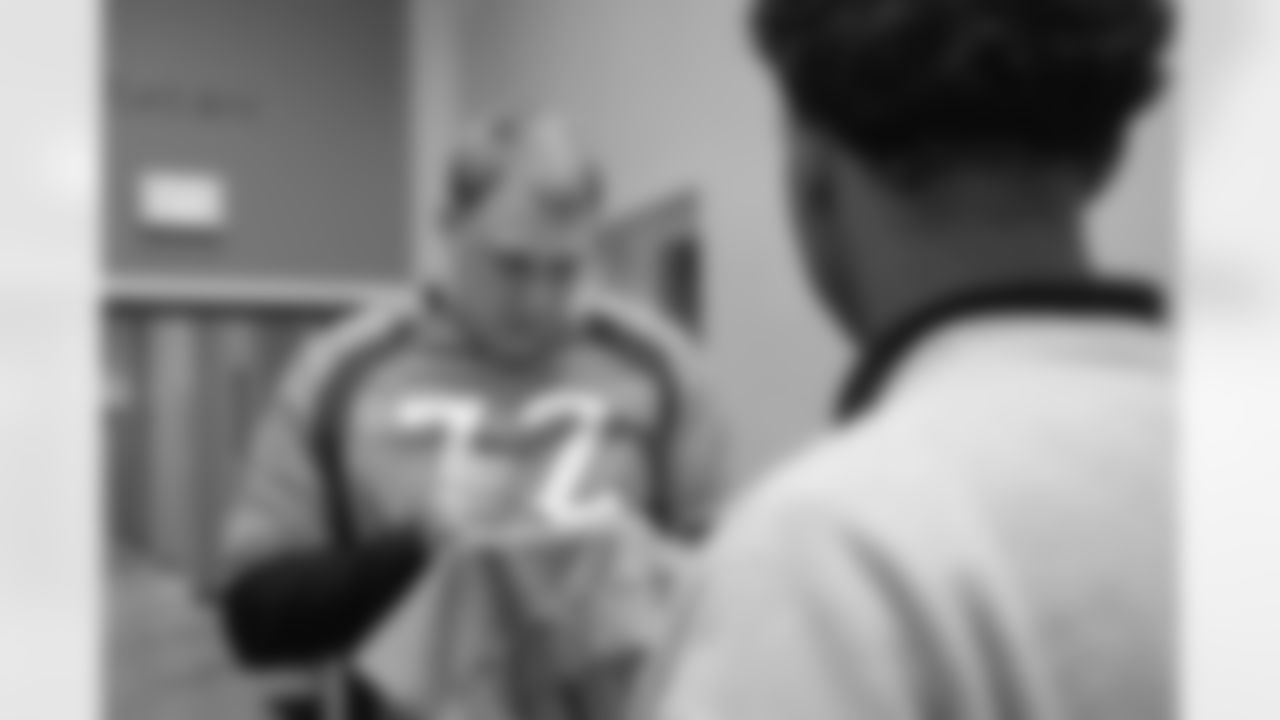 Garett Bolles during a holiday event for children in the juvenile detention center at the Marvin W. Foote Youth Services Center in Centennial, Colorado on December 20, 2022. Photo by Amanda Gerlach/DenverBroncos.com