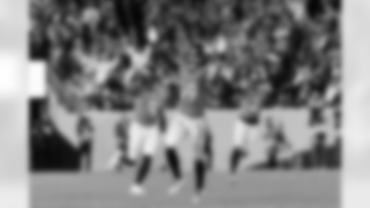 Denver Broncos linebacker Alex Singleton (49) celebrates after a play during the Broncos' Week 15 game against the Green Bay Packers at Empower Field at Mile High in Denver, Colorado on December 14, 2025. Photo by Ben Swanson / Denver Broncos