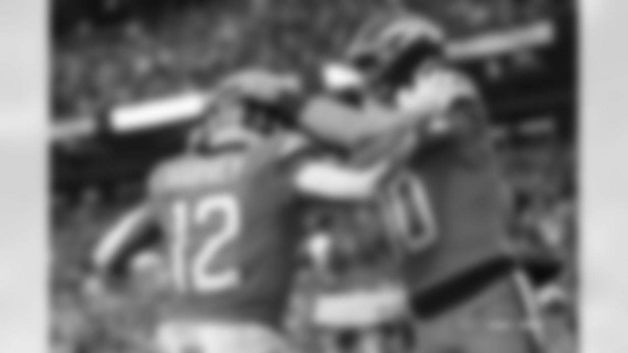 RJ Harvey (12) and Bo Nix (10) during the Broncos' Week 16 game against the Jacksonville Jaguars at Empower Field at Mile High in Denver, Colorado on December 21, 2025. Photo by Gabriel Christus / Denver Broncos