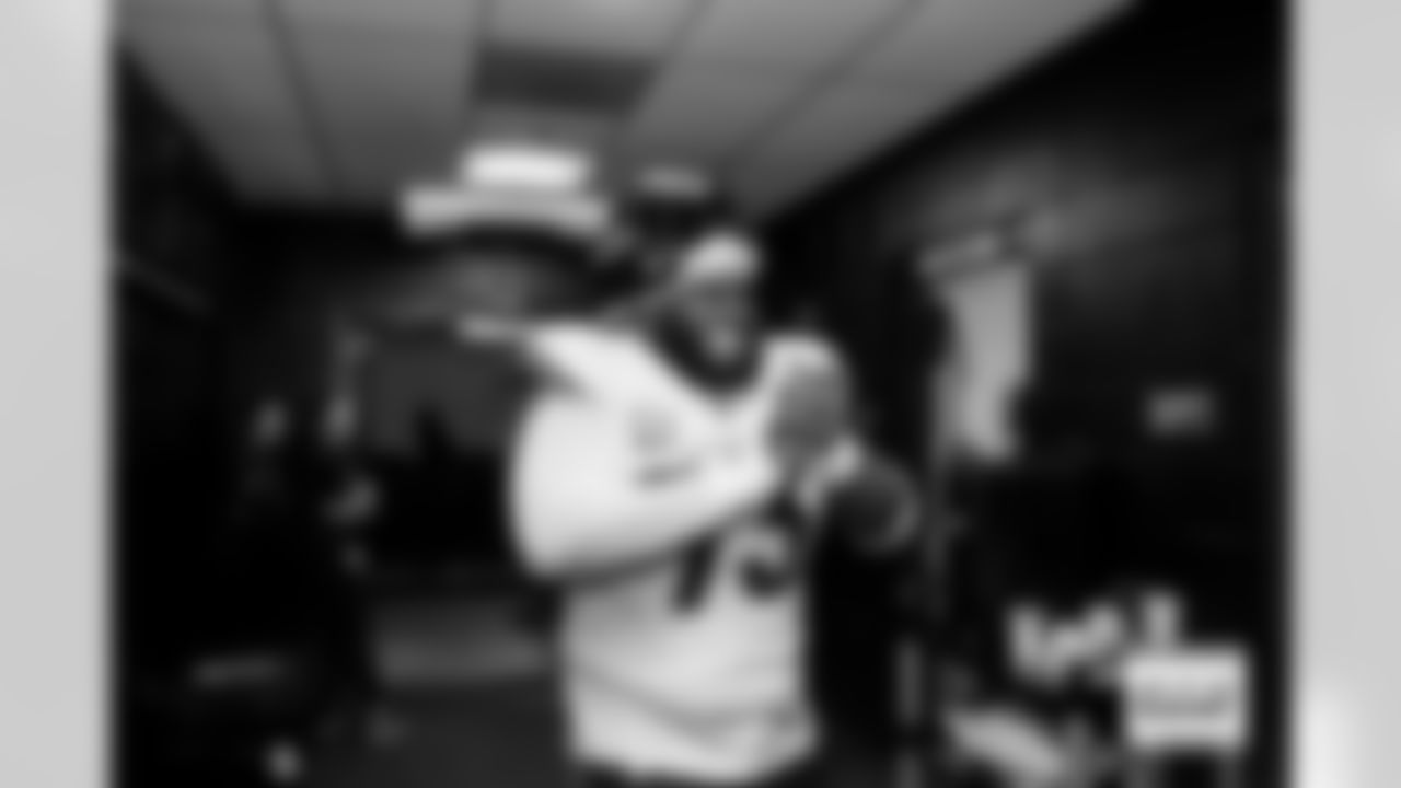 Denver Broncos defensive tackle D.J. Jones (93) celebrates in the locker room after the Broncos' Week 5 game against the Philadelphia Eagles at Lincoln Financial Field in Philadelphia, Pennsylvania on October 5, 2025. Photo by Gabriel Christus / Denver Broncos