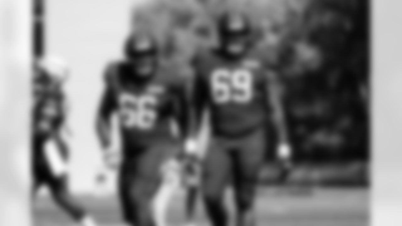 Offensive tackle Joshua Miles (66) and Offensive tackle Tyre Phillip (69) during practice at CrossCountry Mortgage Campus on September 17, 2025.