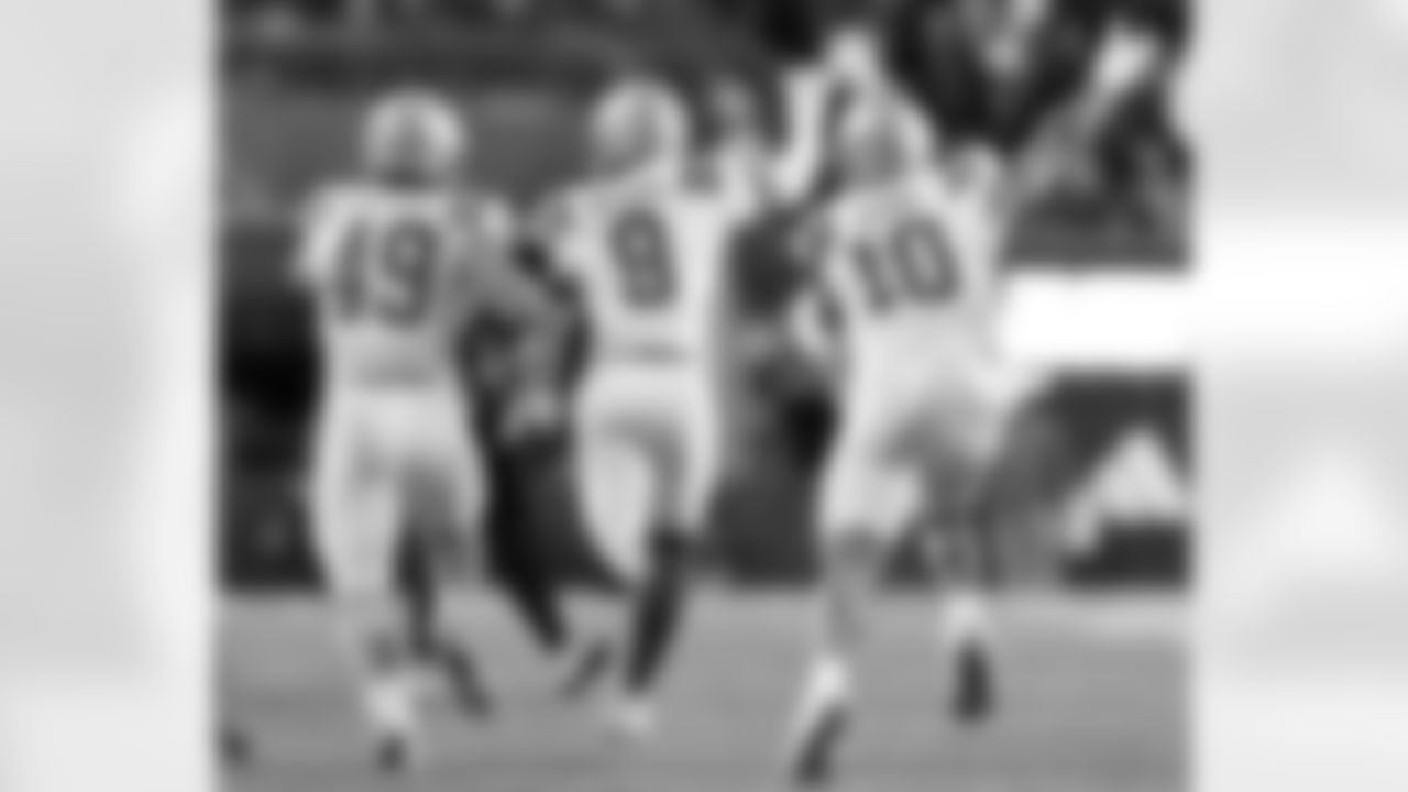 UCLA's Carson Schwesinger (49), Kaylin Moore (9) and Ale Kaho (10) celebrate Moore's interception to end the game against Nebraska in the second half of an NCAA college football game Saturday, Nov. 2, 2024, in Lincoln, Neb. UCLA defeated Nebraska 27-20. (AP Photo/Rebecca S. Gratz)