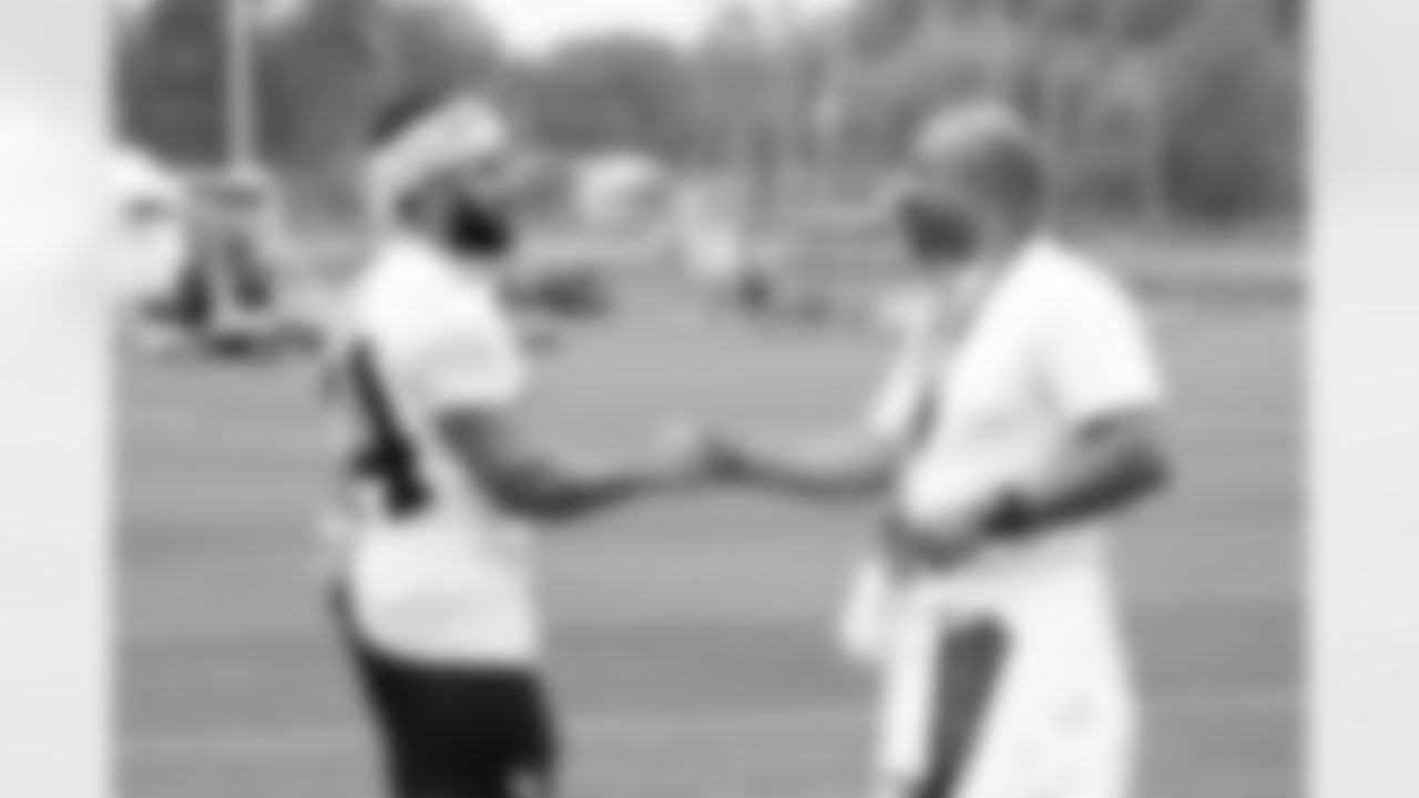 Cornerback Anthony Kendall (44) and youth football guests during the sixth day of OTAs at CrossCountry Mortgage Campus on June 6, 2025.