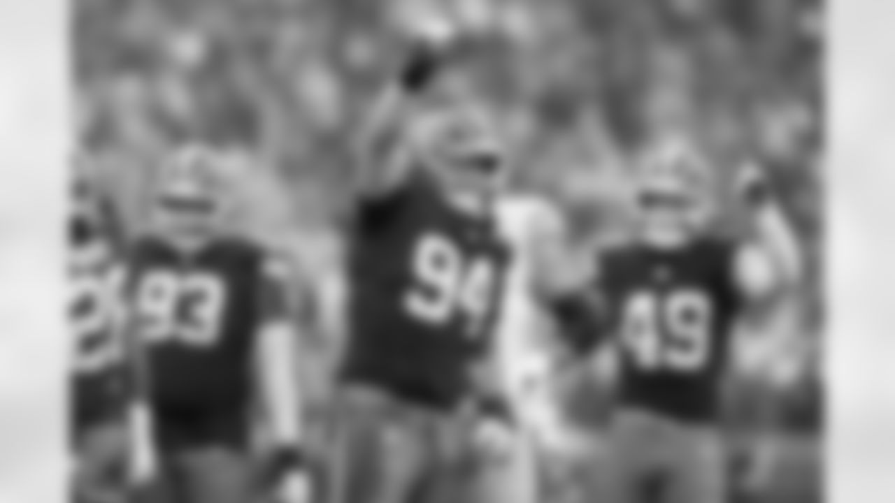 Defensive tackle Mason Graham (94)