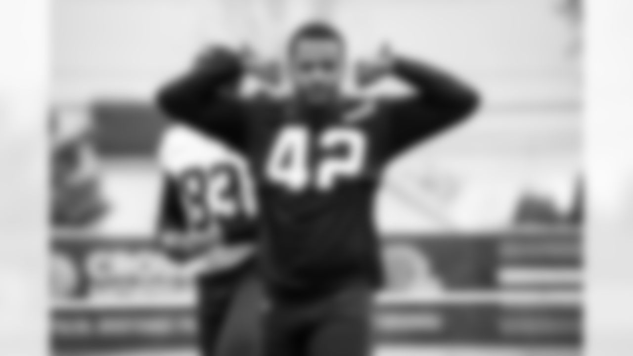 Linebacker Tony Fields II (42) during a workout in Phase II of the offseason at CrossCountry Mortgage Campus on April 30, 2024.
