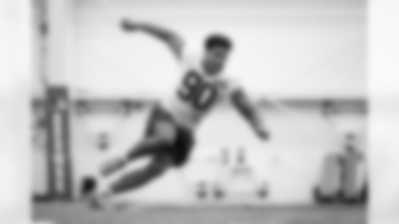 Defensive end Joe Tryon-Shoyinka (90) during fieldwork in Phase II of the offseason at CrossCountry Mortgage Campus on May 15, 2025.