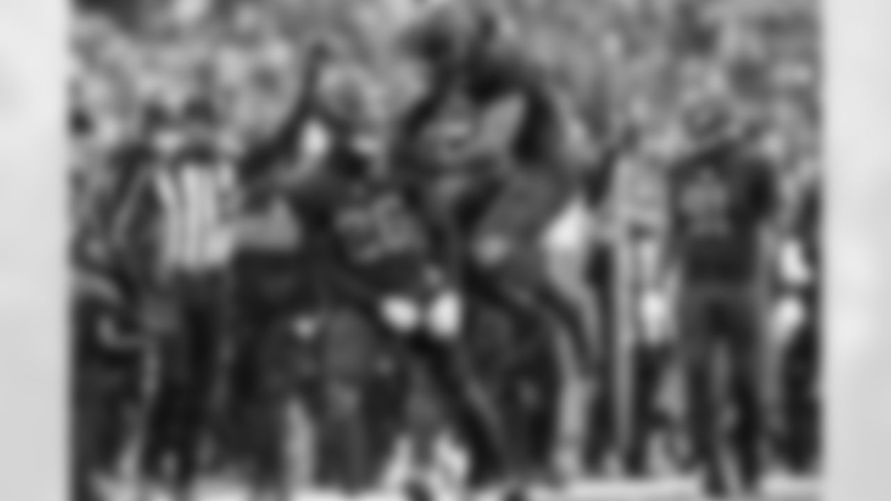 Cornerback Myles Harden (26) and Safety Grant Delpit (9) during a NFL football game between the Tennessee Titans and Cleveland Browns on December 7, 2025 at Huntington Bank Field.