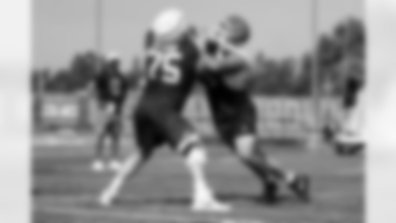 Offensive guard Joel Bitonio (75) and Defensive tackle Mason Graham (94) during Day 4 of Training Camp at CrossCountry Mortgage Campus on July 26, 2025.