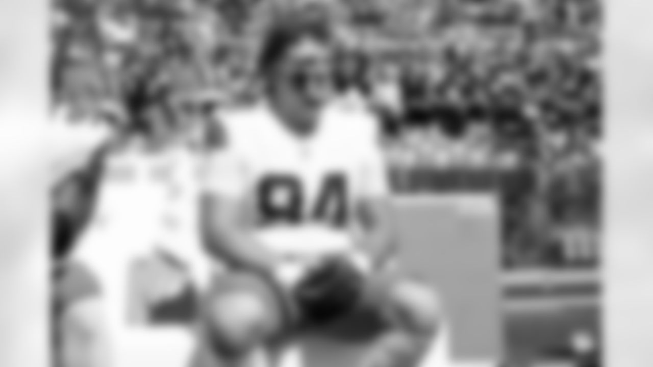 Defensive tackle Mason Graham (94)