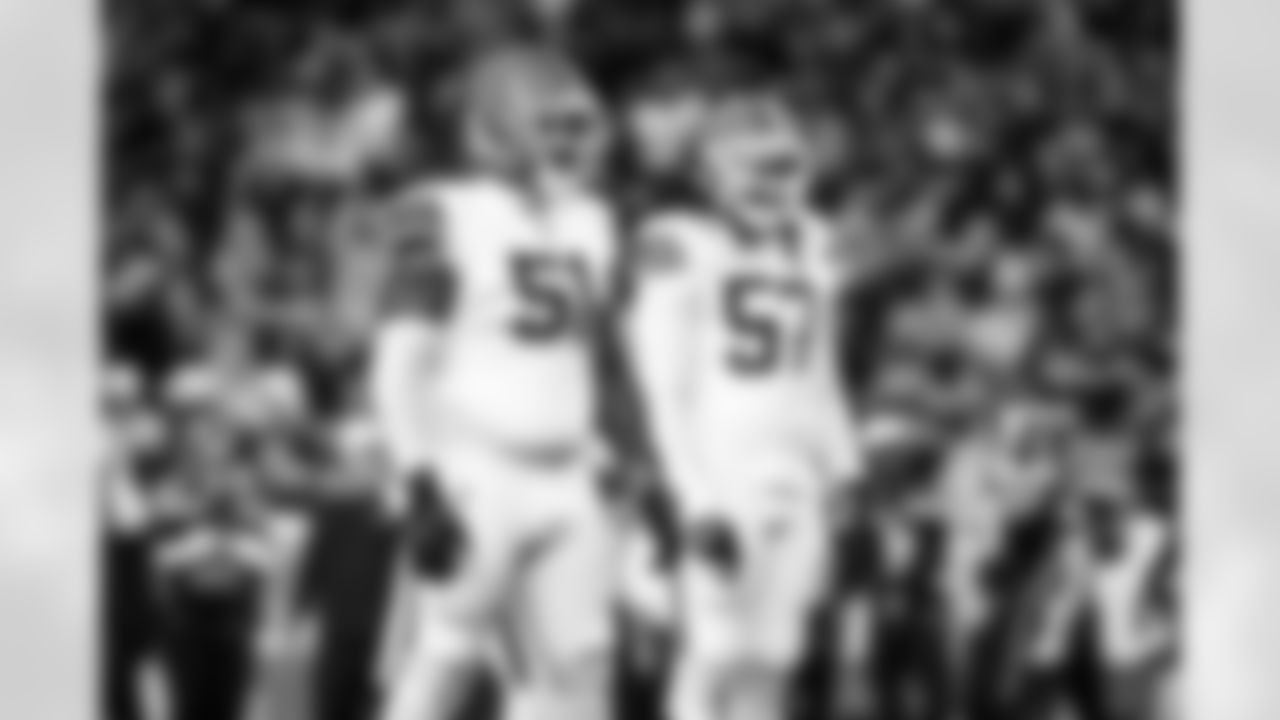 Defensive tackle Mike Hall Jr. (51) and Defensive end Isaiah McGuire (57) during a preseason NFL football game between the Cleveland Browns and Seattle Seahawks on August 24, 2024 at Lumen Field.