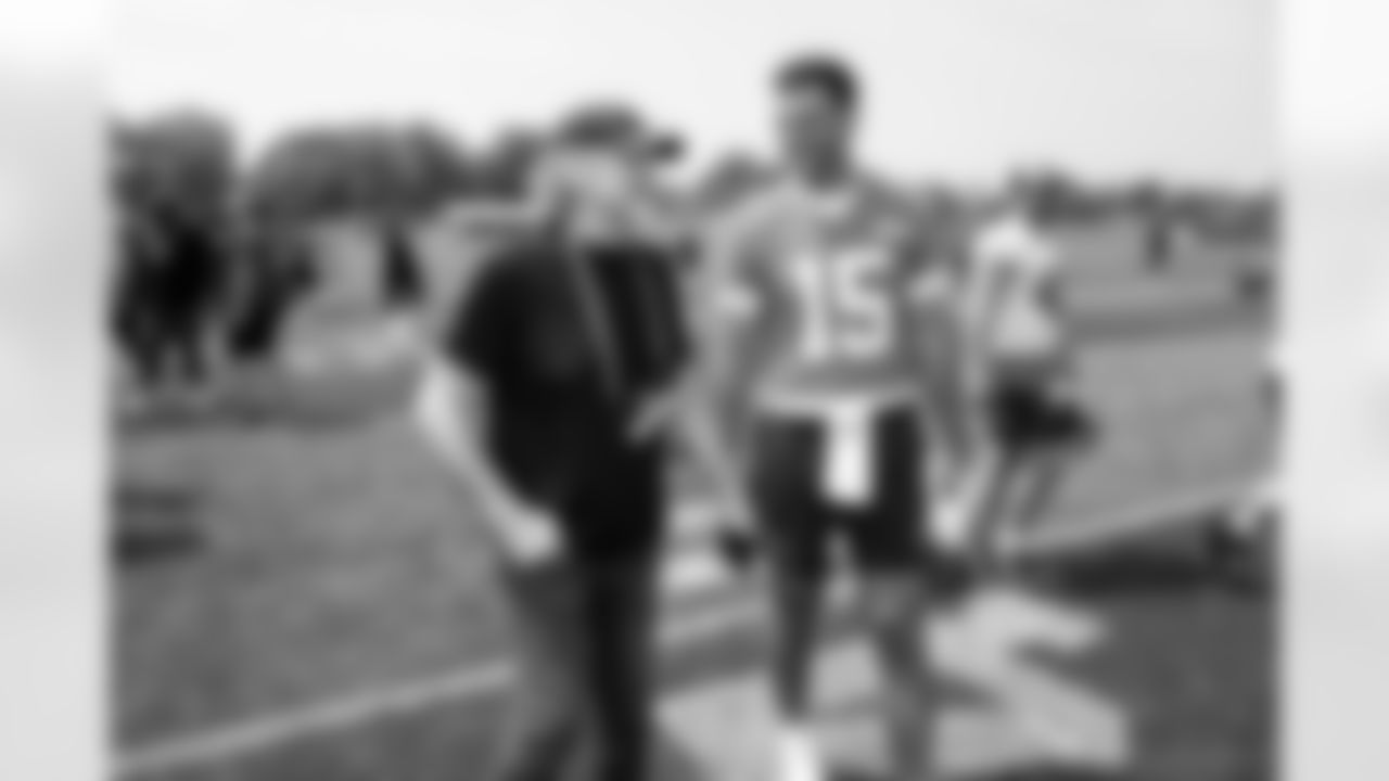 Bob Golic and Quarterback Joe Flacco (15) during the third day of mandatory minicamp at CrossCountry Mortgage Campus on June 12, 2025.