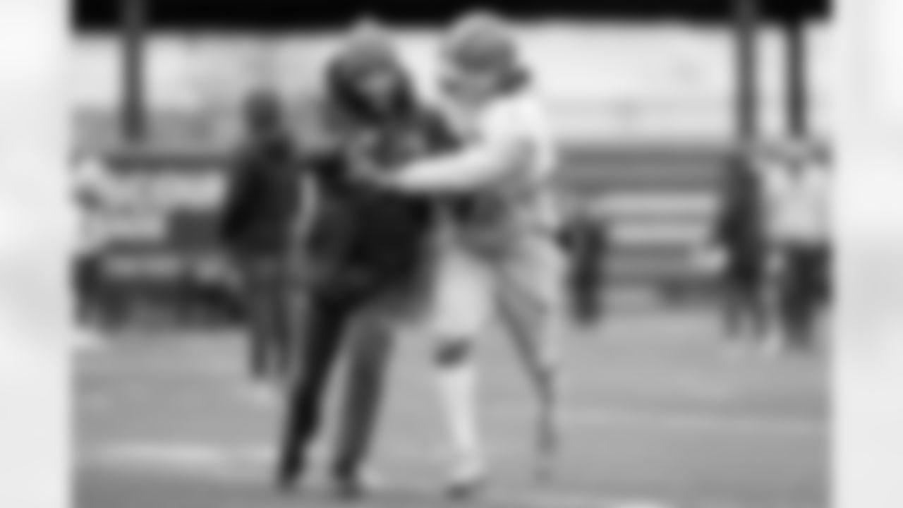 Football Operations Assistant Hajriz Aliu and Safety Grant Delpit (9) during practice at CrossCountry Mortgage Campus on November 26, 2025.