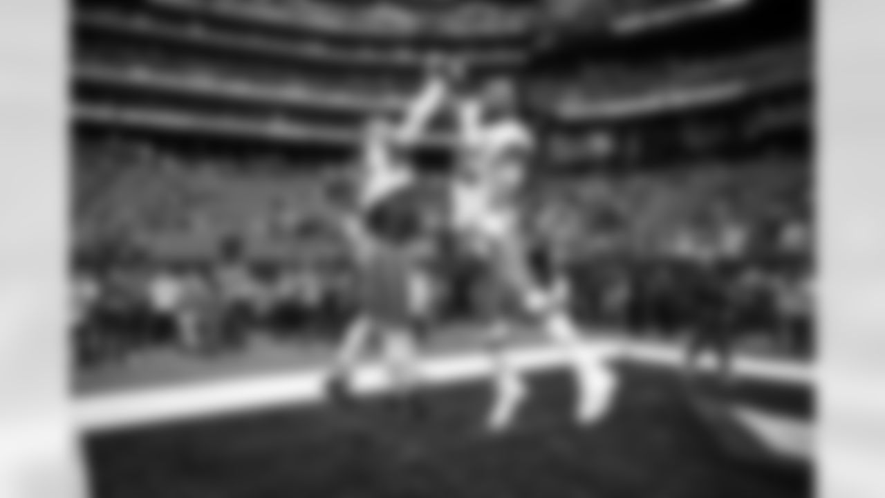 Tight end David Njoku (85) and Defensive end Myles Garrett (95) before a NFL Wild Card playoff football game between the Cleveland Browns and Houston Texans on January 13, 2024 at NRG Stadium.