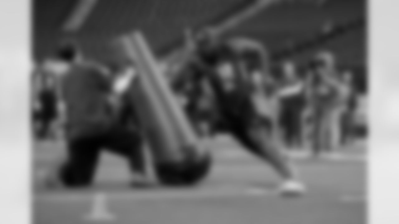 Nebraska defensive lineman Maliek Collins runs a drill at the NFL football scouting combine in Indianapolis, Sunday, Feb. 28, 2016. (AP Photo/Michael Conroy)