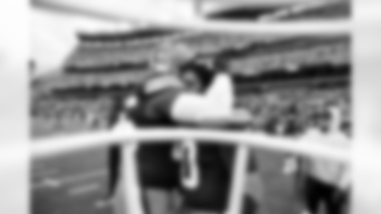 Tight end David Njoku (85) and Linebacker Devin Bush (30) before a NFL football game between the Baltimore Ravens and Cleveland Browns on November 16, 2025 at Huntington Bank Field.