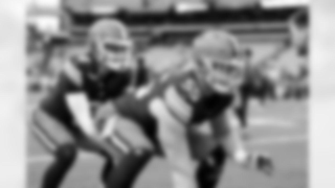 Quarterback Dillon Gabriel (8) and Center Ethan Pocic (55) before a NFL football game between the Baltimore Ravens and Cleveland Browns on November 16, 2025 at Huntington Bank Field.