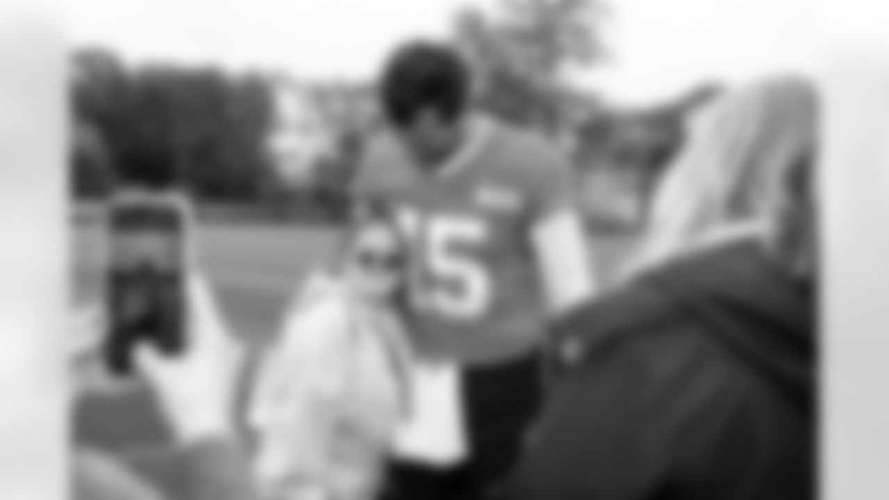 Quarterback Joe Flacco (15) and community guests during the first day of OTAs at CrossCountry Mortgage Campus on May 28, 2025.