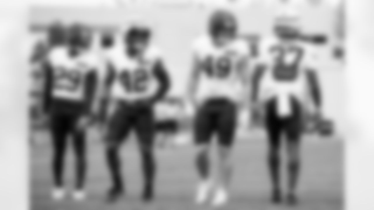 Linebacker Easton Mascarenas-Arnold (42) and Linebacker Carson Schwesinger (49) during practice at CrossCountry Mortgage Campus on October 15, 2025.
