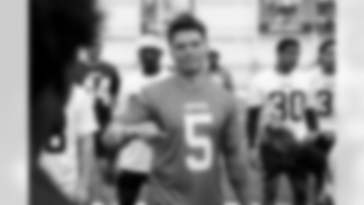 Quarterback Dillon Gabriel (5) during a workout on the first day of Rookie Minicamp at CrossCountry Mortgage Campus on May 9, 2025.