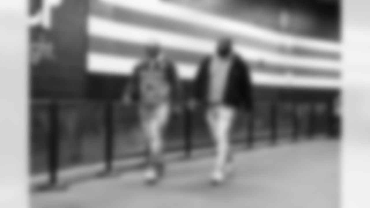 Defensive lineman Adin Huntington (98) and Defensive tackle Shelby Harris (93) before a NFL football game between the Buffalo Bills and Cleveland Browns on December 21, 2025 at Huntington Bank Field.