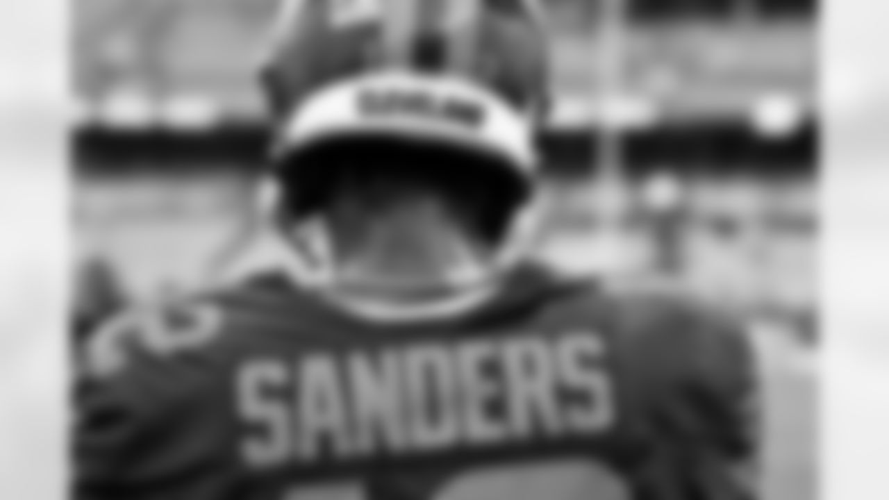 Quarterback Shedeur Sanders (12) before a NFL football game between the Miami Dolphins and Cleveland Browns on October 19, 2025 at Huntington Bank Field.