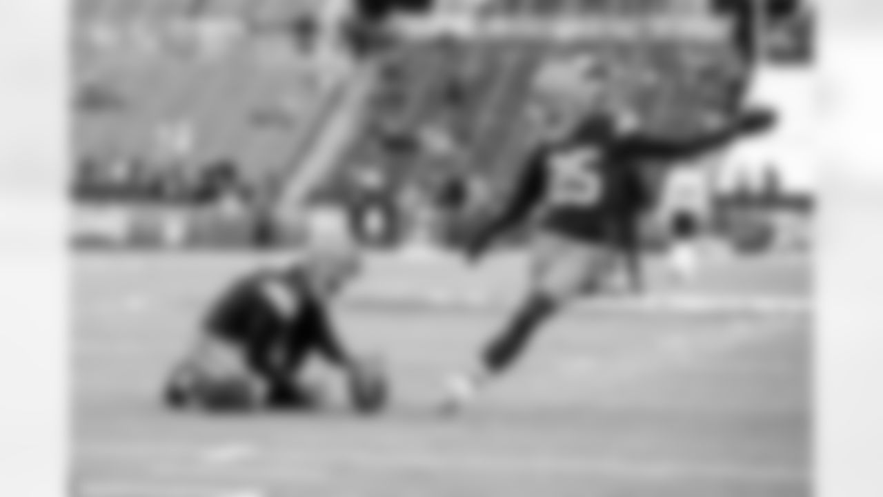 Punter Corey Bojorquez (13) and Kicker Andre Szmyt (25) before a NFL football game between the Baltimore Ravens and Cleveland Browns on November 16, 2025 at Huntington Bank Field.