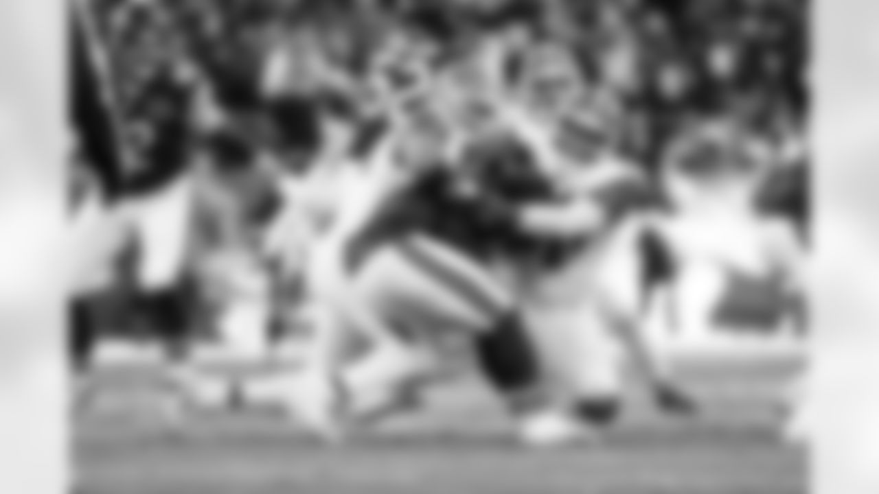 21.5 - Defensive end Myles Garrett (95) and Defensive tackle Shelby Harris (93) sack Bears Quarterback Caleb Williams (18)