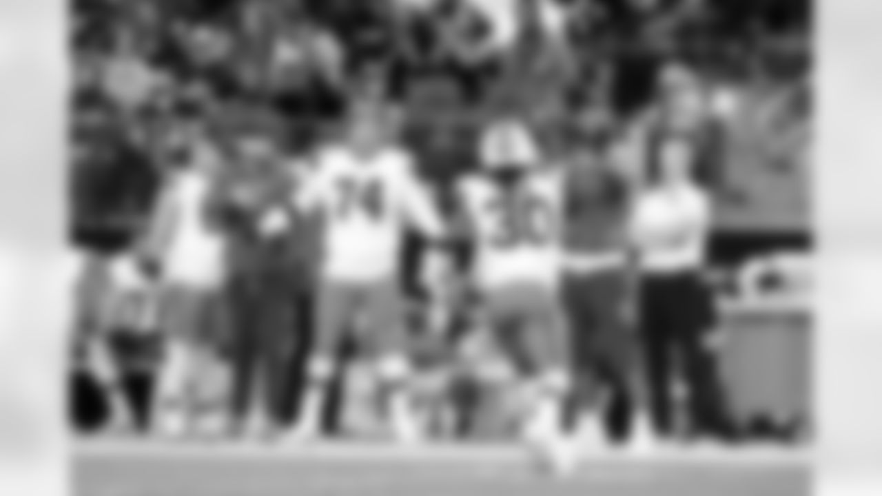 Offensive guard Teven Jenkins (74) and Linebacker Devin Bush (30) during a NFL football game between the Cleveland Browns and Las Vegas Raiders on November 23, 2025 at Allegiant Stadium.