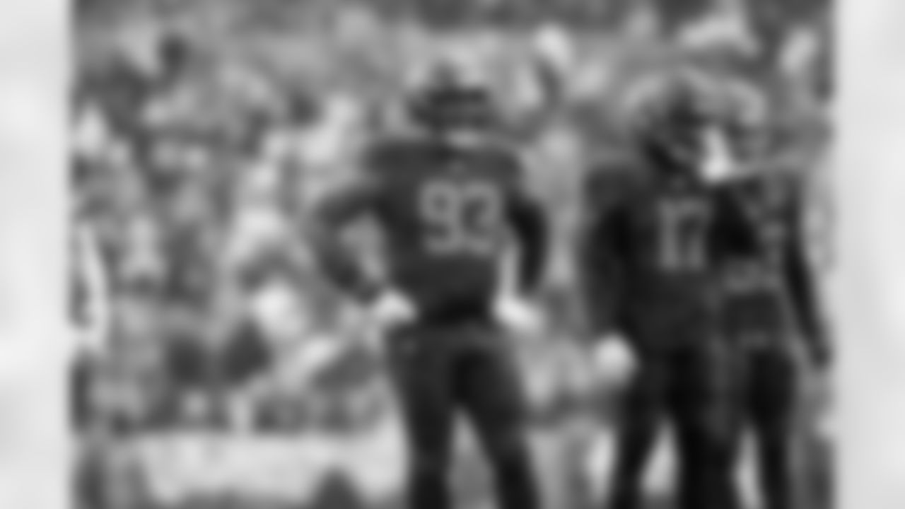 Defensive tackle Shelby Harris (93) and Linebacker Jerome Baker (17) during a NFL football game between the Tennessee Titans and Cleveland Browns on December 7, 2025 at Huntington Bank Field.