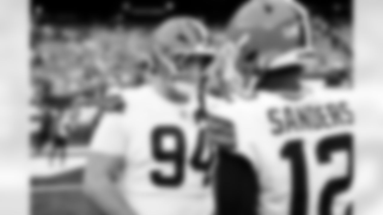 Defensive tackle Mason Graham (94) and Quarterback Shedeur Sanders (12) before a NFL football game between the Cleveland Browns and New York Jets on November 9, 2025 at MetLife Stadium.