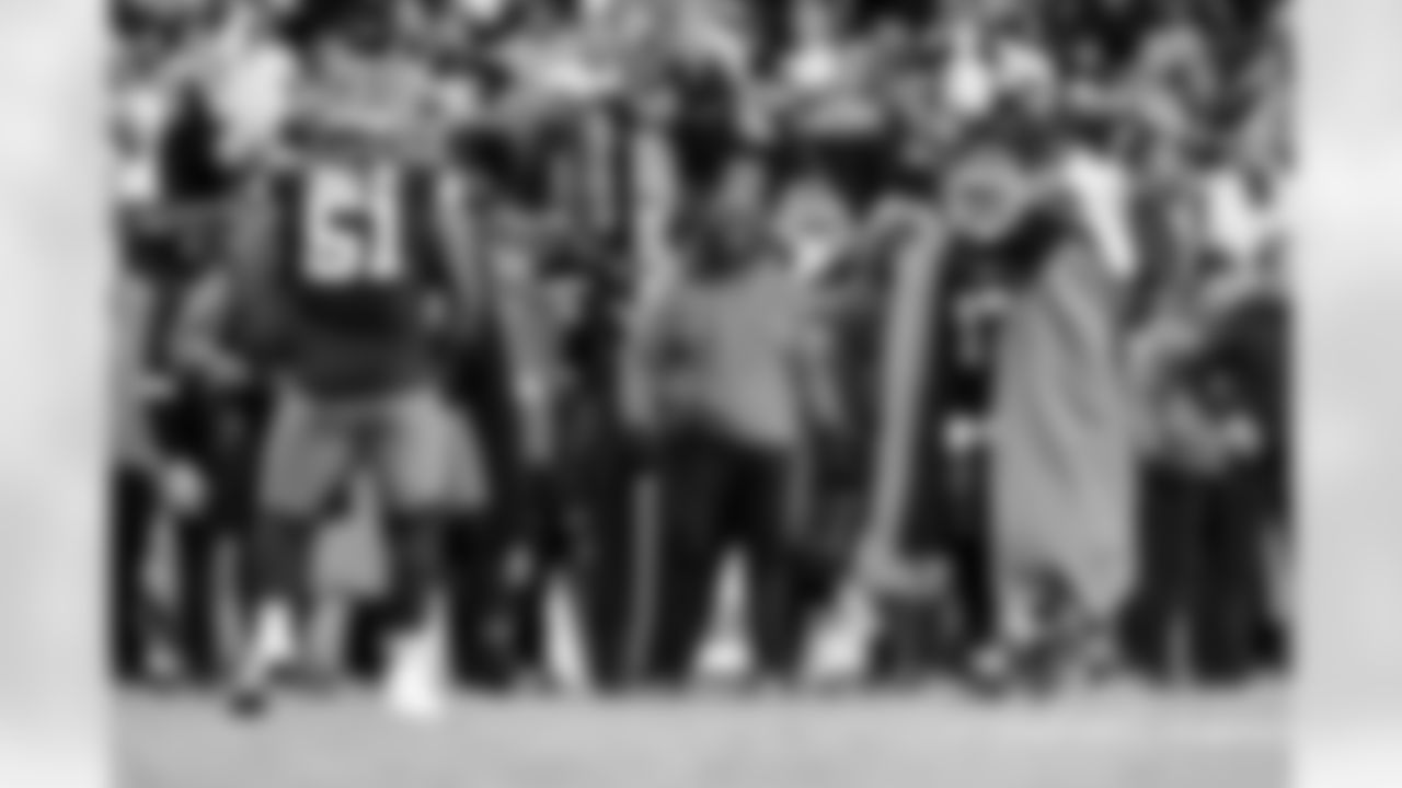 Defensive tackle Mike Hall Jr. (51) and Defensive Line Coach Jacques Cesaire during a NFL football game between the Baltimore Ravens and Cleveland Browns on November 16, 2025 at Huntington Bank Field.