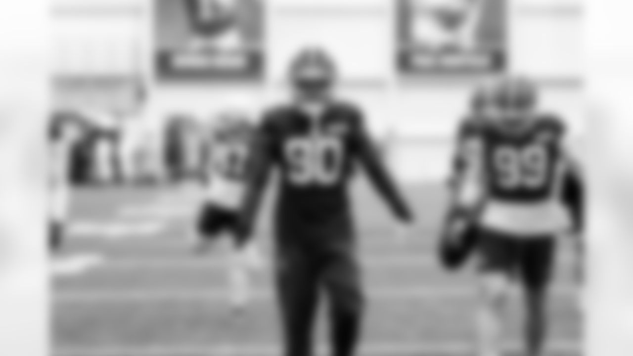 Defensive end K.J. Henry (90) during practice at CrossCountry Mortgage Campus on December 10, 2025.