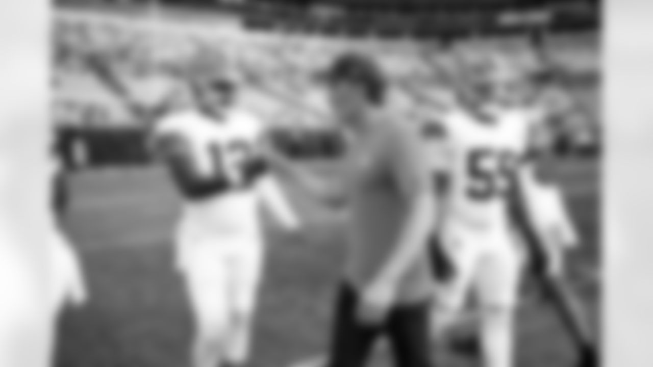 Quarterback Shedeur Sanders (12) and Head Coach Kevin Stefanski before a preseason NFL football game between the Cleveland Browns and Carolina Panthers on August 8, 2025 at Bank of America Stadium.