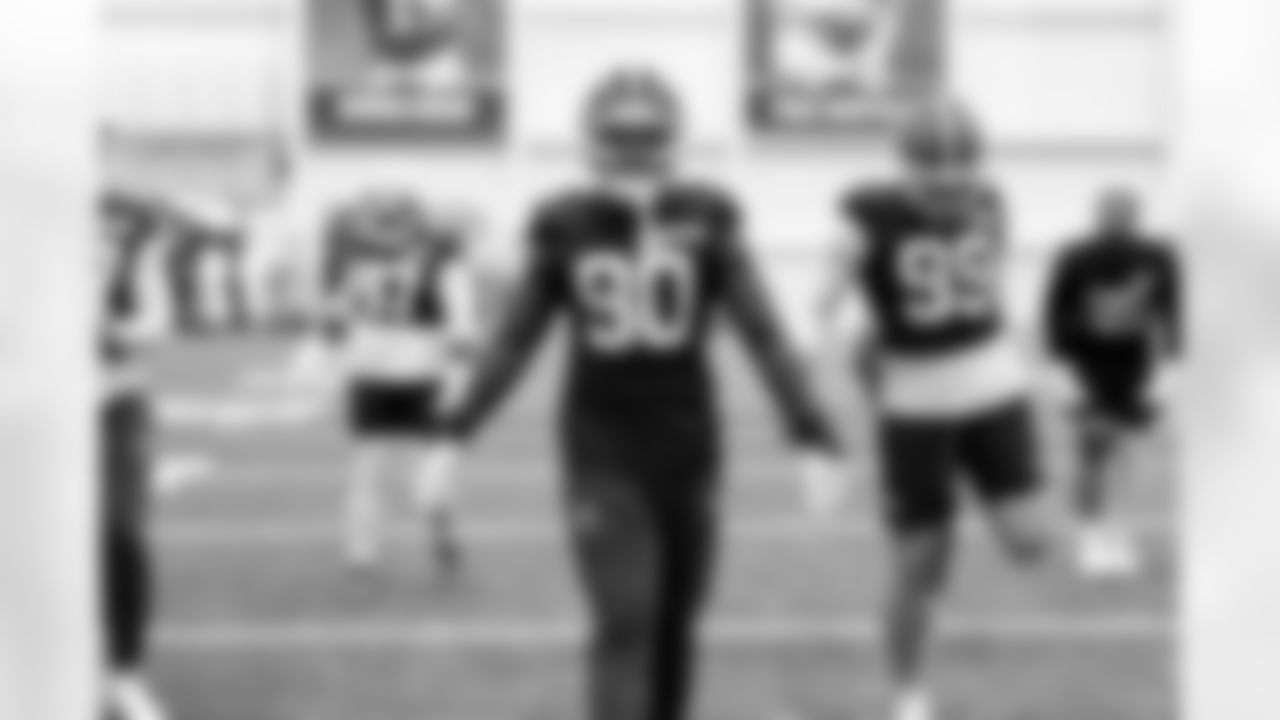 Defensive end K.J. Henry (90) during practice at CrossCountry Mortgage Campus on December 10, 2025.