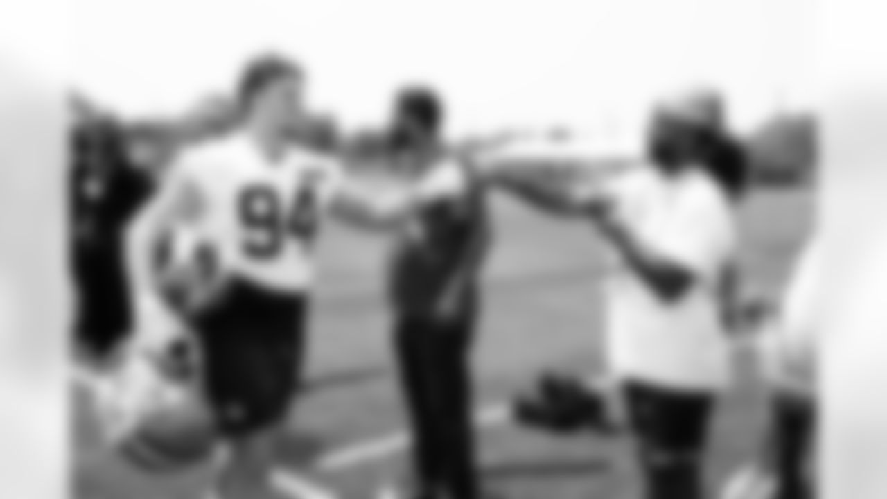 Defensive tackle Mason Graham (94) and social justice guests during the fourth day of OTAs at CrossCountry Mortgage Campus on June 3, 2025.