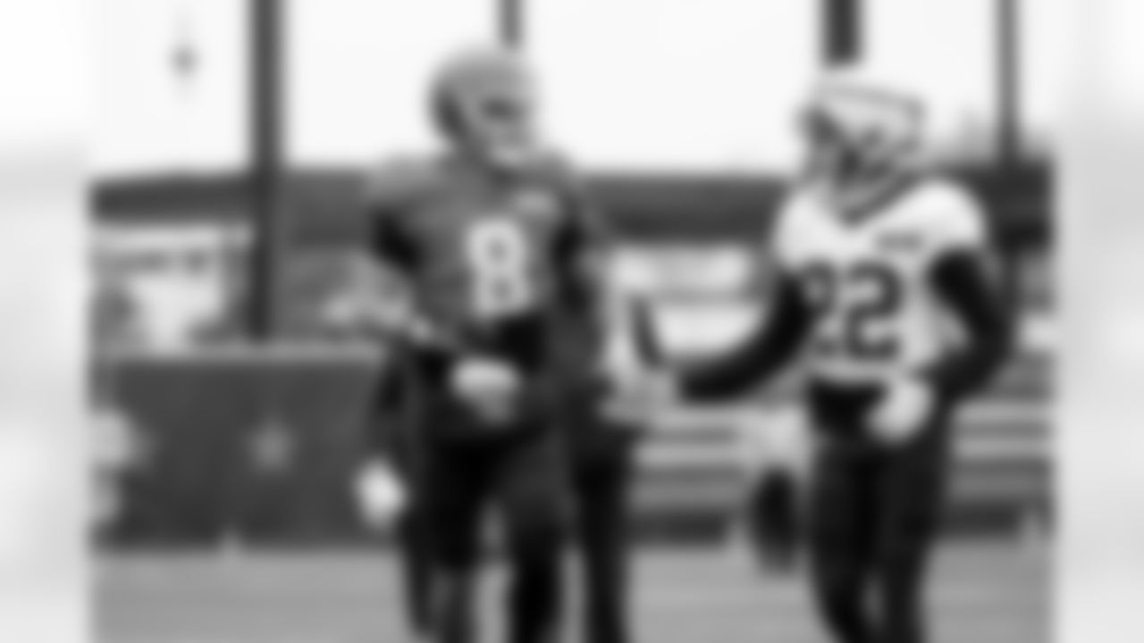 Quarterback Dillon Gabriel (8) and Running back Dylan Sampson (22) during practice at CrossCountry Mortgage Campus on October 22, 2025.