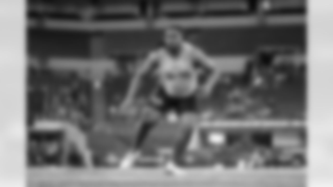 Kansas State offensive lineman KT Leveston runs a drill at the NFL football scouting combine, Sunday, March 3, 2024, in Indianapolis. (AP Photo/Michael Conroy)