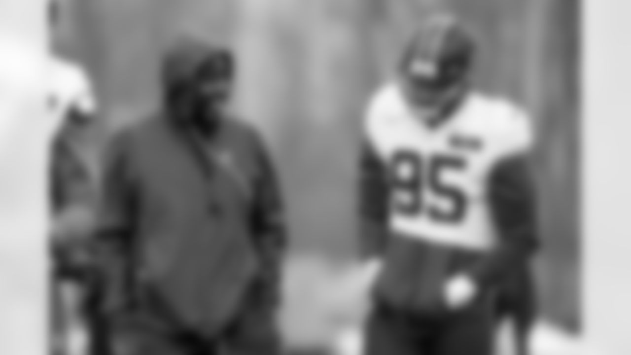 Director of Strength and Conditioning Larry Jackson and Defensive end Myles Garrett (95) during practice at CrossCountry Mortgage Campus on December 3, 2025.