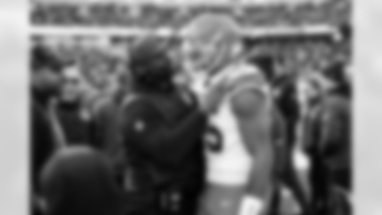 Defensive Line Coach Jacques Cesaire and Defensive end Myles Garrett (95) during a NFL football game between the Cleveland Browns and Cincinnati Bengals on January 4, 2026 at Paycor Stadium. The Browns won 20-18.