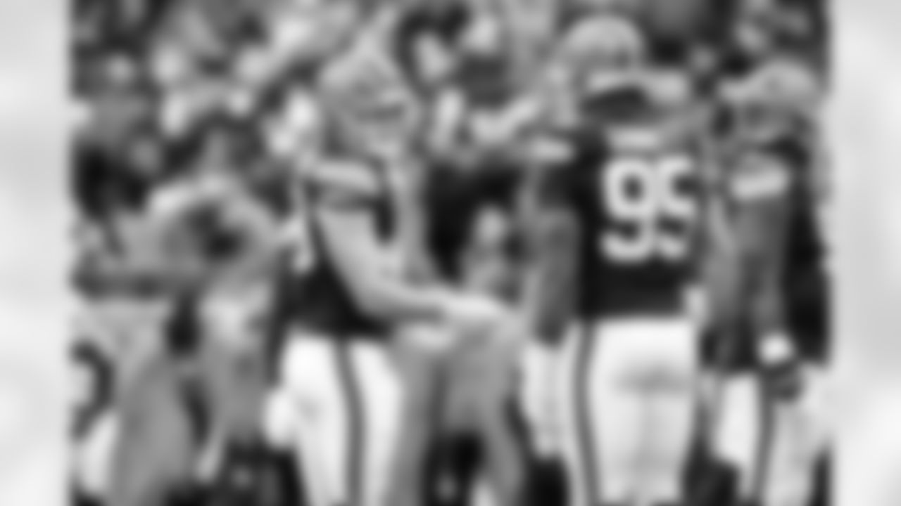 Linebacker Carson Schwesinger (49) and Defensive end Myles Garrett (95) during a NFL football game between the San Francisco 49ers and Cleveland Browns on November 30, 2025 at Huntington Bank Field.