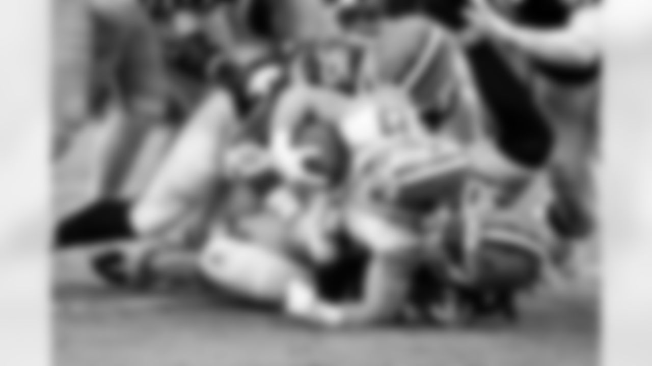 Linebacker Devin Bush (30) and Defensive end Myles Garrett (95) during a NFL football game between the San Francisco 49ers and Cleveland Browns on November 30, 2025 at Huntington Bank Field.