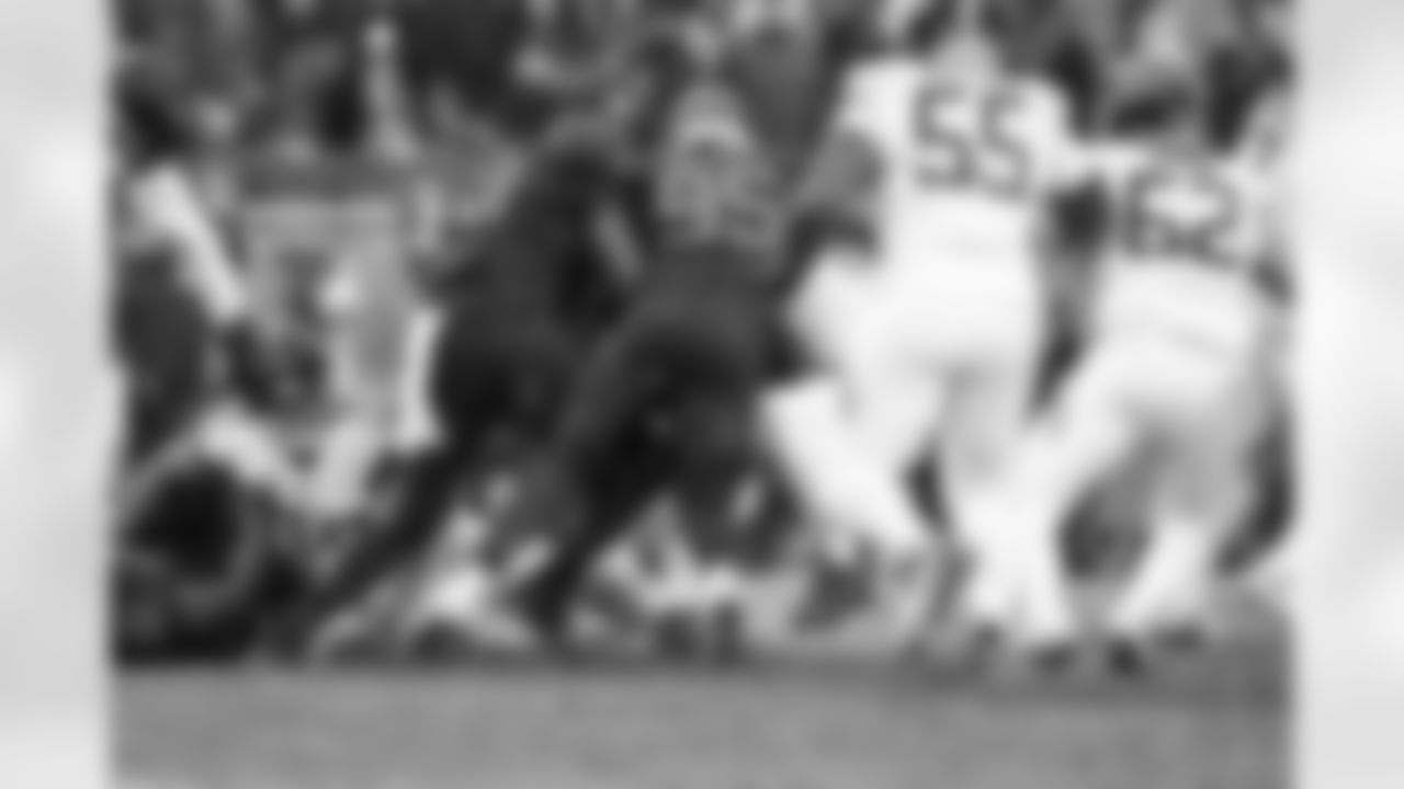 Defensive end Alex Wright (91) and Defensive end Myles Garrett (95) during a NFL football game between the Tennessee Titans and Cleveland Browns on December 7, 2025 at Huntington Bank Field.