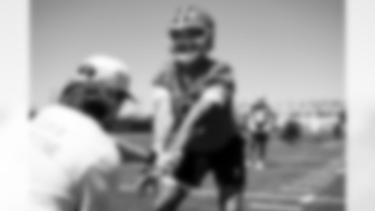 Quarterback Dillon Gabriel (5) during fieldwork on the first day of Rookie Minicamp at CrossCountry Mortgage Campus on May 9, 2025.
