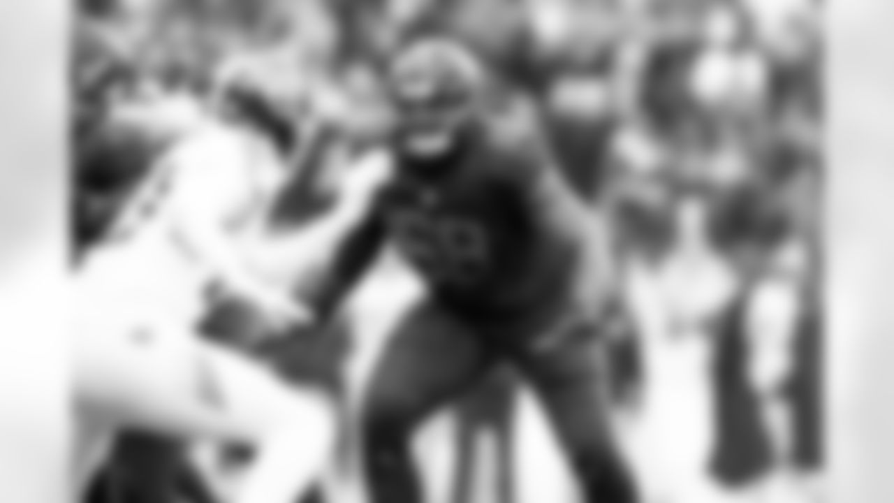 Offensive tackle Cam Robinson (68)