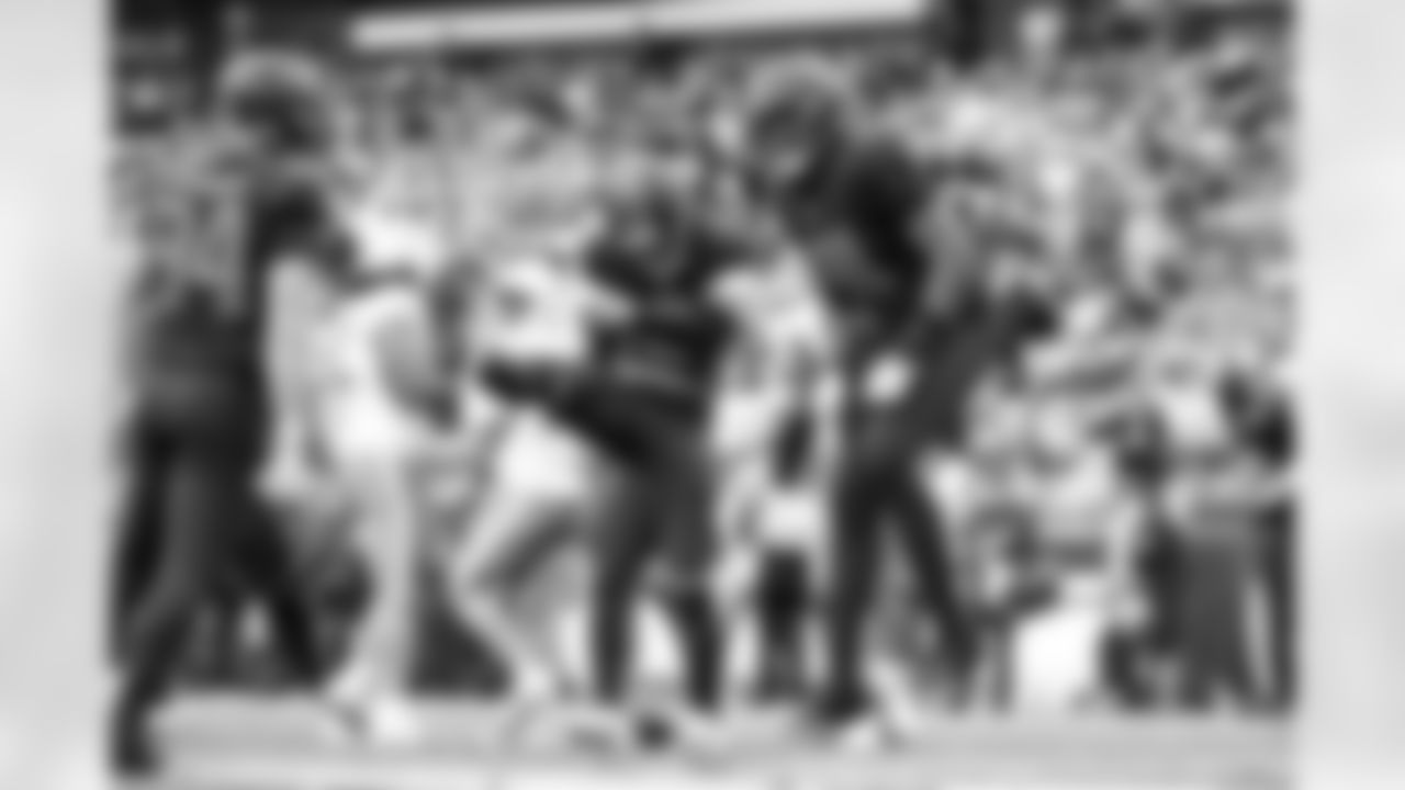 Defensive tackle Mason Graham (94), Safety Grant Delpit (9), and Defensive end Alex Wright (91) during a NFL football game between the Miami Dolphins and Cleveland Browns on October 19, 2025 at Huntington Bank Field.