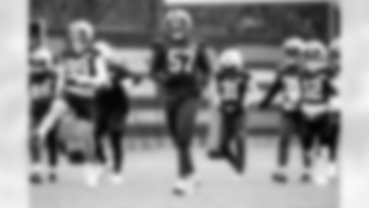 Defensive end Isaiah McGuire (57) during practice at CrossCountry Mortgage Campus on December 19, 2024.