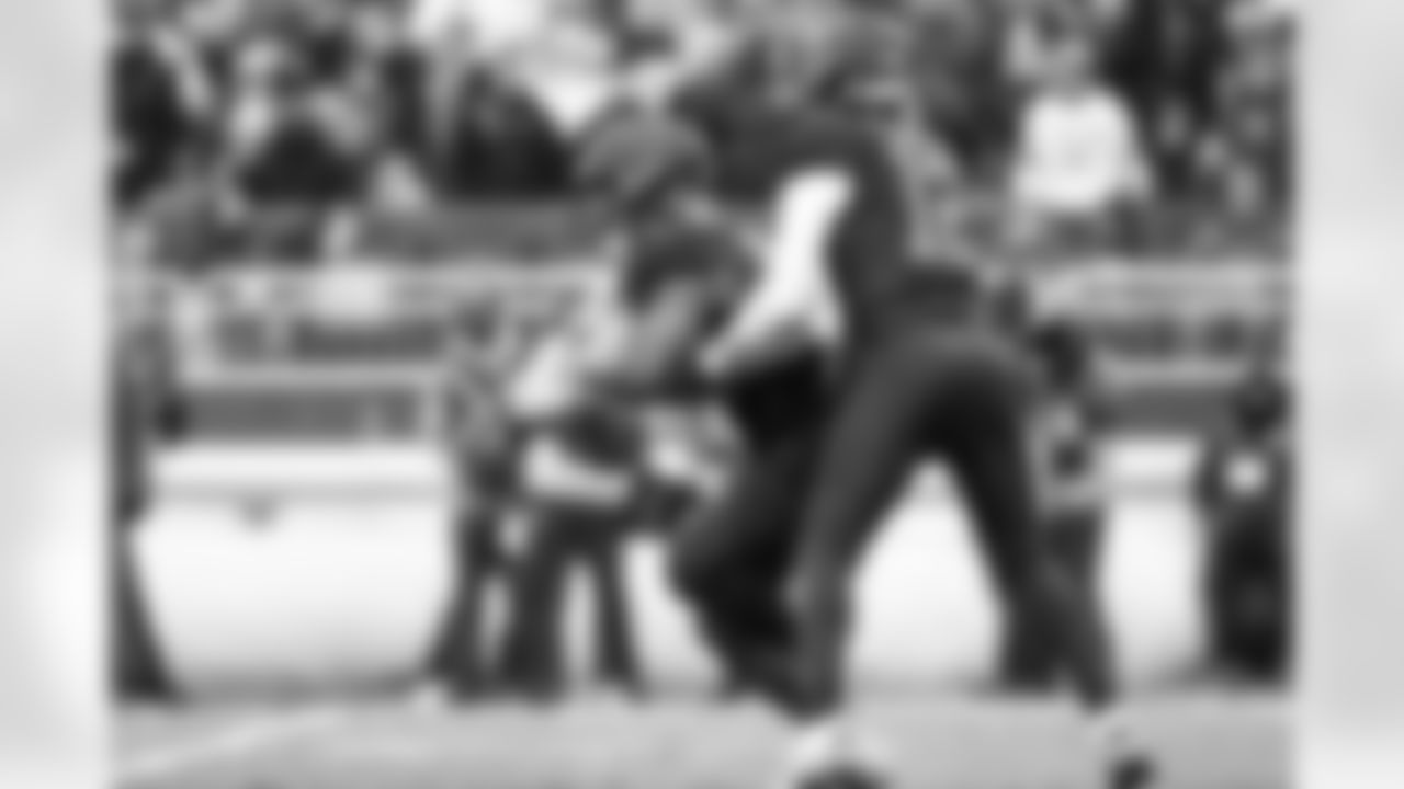 Running back Quinshon Judkins (10) and Quarterback Shedeur Sanders (12) during a NFL football game between the Tennessee Titans and Cleveland Browns on December 7, 2025 at Huntington Bank Field.